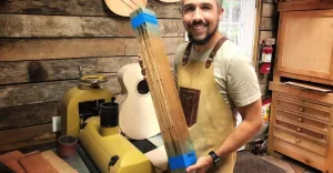 Local Craftsman Chris Alvarado Building 50th Anniversary Woodstock Guitar